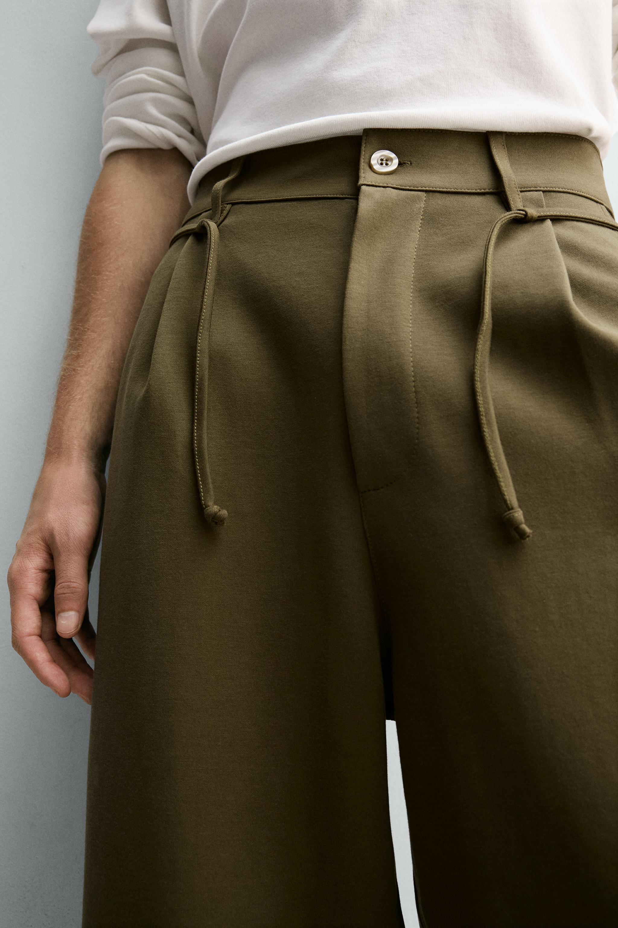 PLEATED DRAWSTRING PANTS